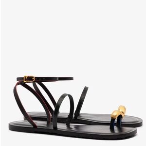 Larroude Biarritz Flat Sandal in Black with Gold Accent. Women’s 8